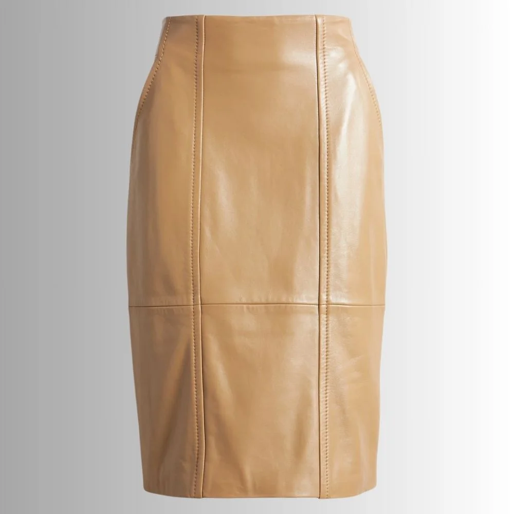 A standalone image of a tan leather pencil skirt against a neutral background, displaying its design details.